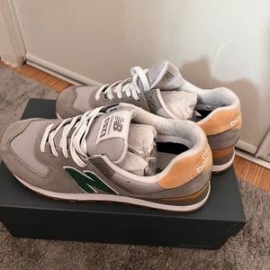 Lightly used New Balance 574 colour way Gray Green, size 7.5